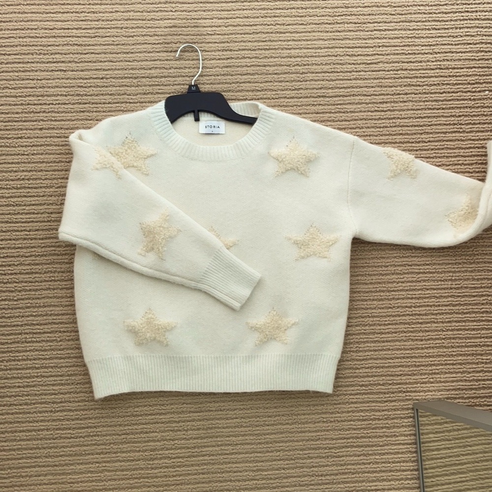 Storia white star sweater.